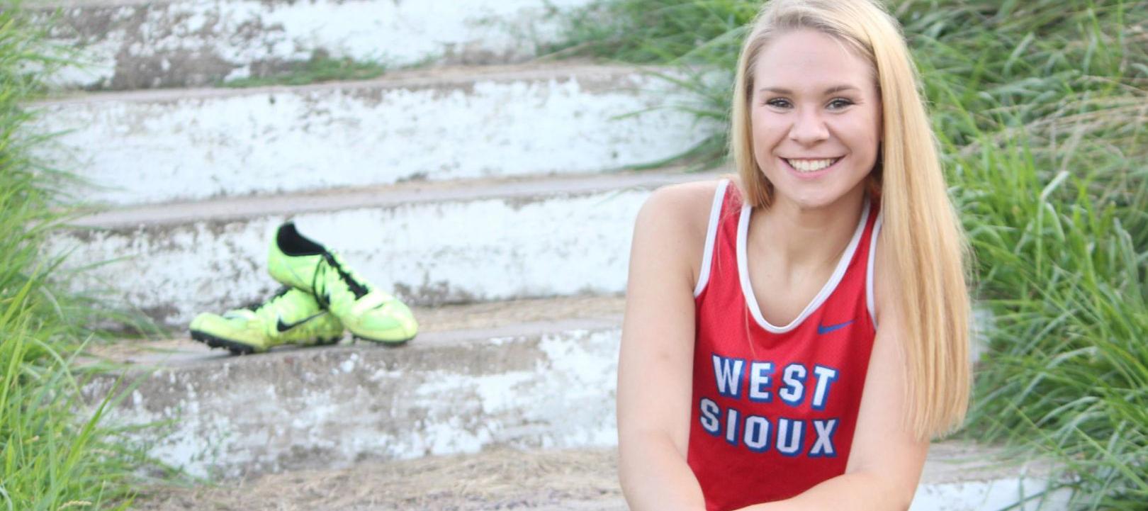 West Sioux runner signs